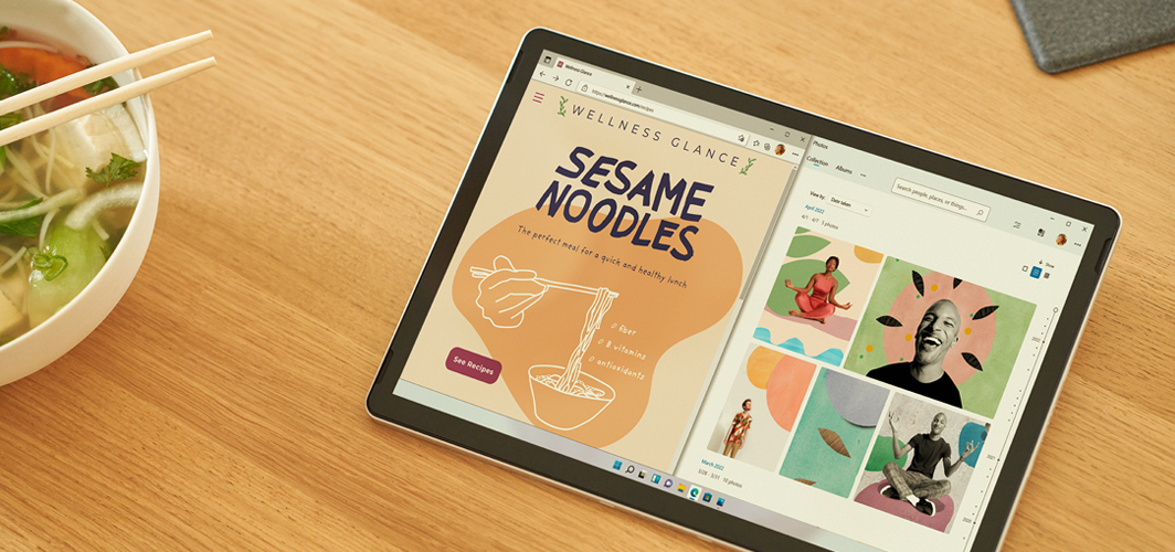 A tablet on a table with a sesame noodle recipe on the screen.