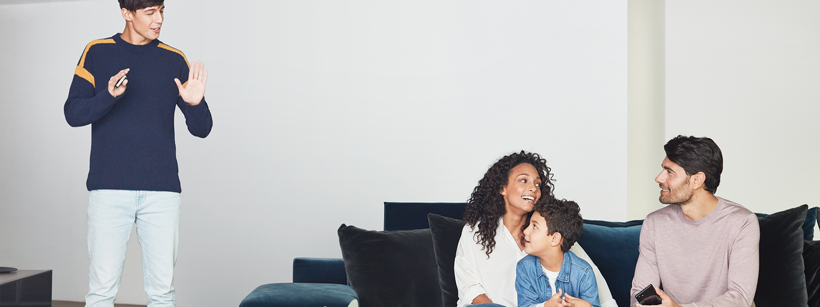 A family hanging out inside their home. 