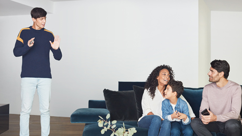 A family hanging out inside their home.